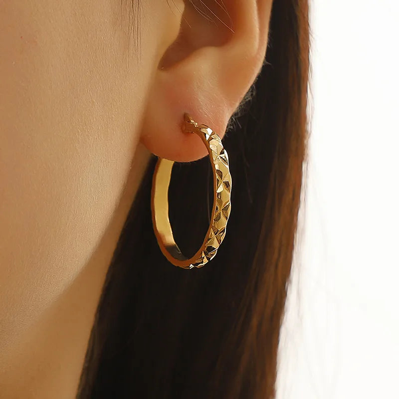 Stamped gold hoops earrings