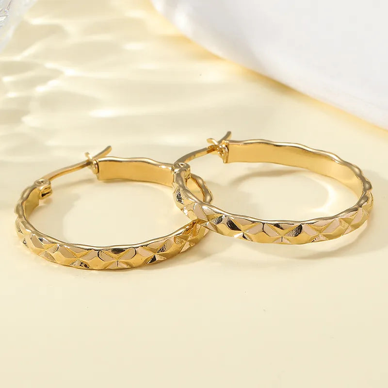 Stamped gold hoops earrings