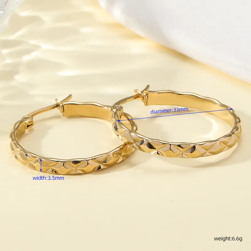 Stamped gold hoops earrings