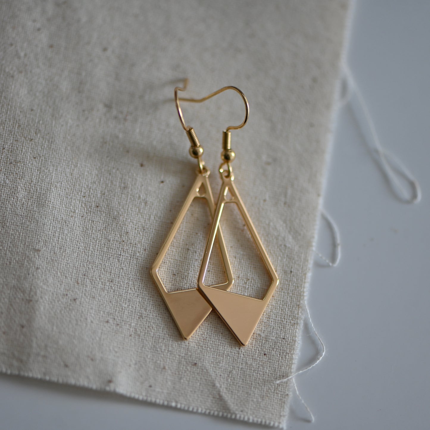 Clearance : Gold diamond shape dangle earrings